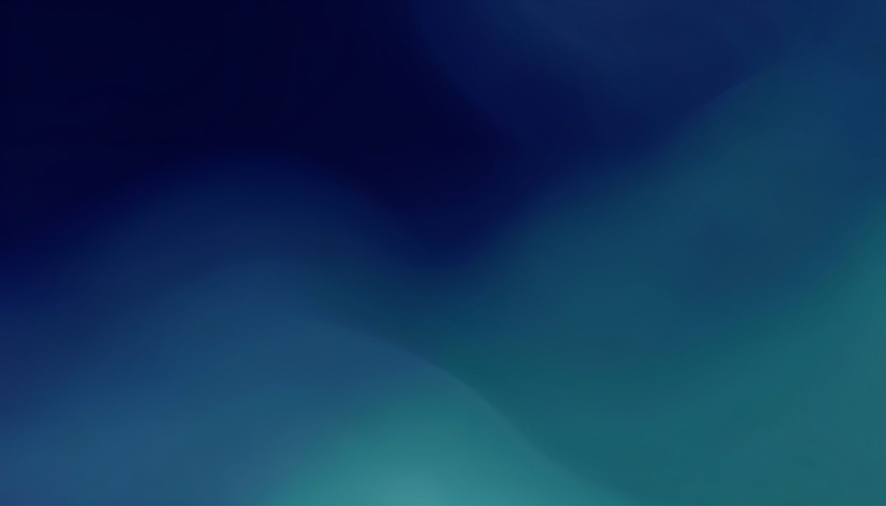 Abstract gradient composition with deep navy and muted teal tones blending softly across a wide canvas
